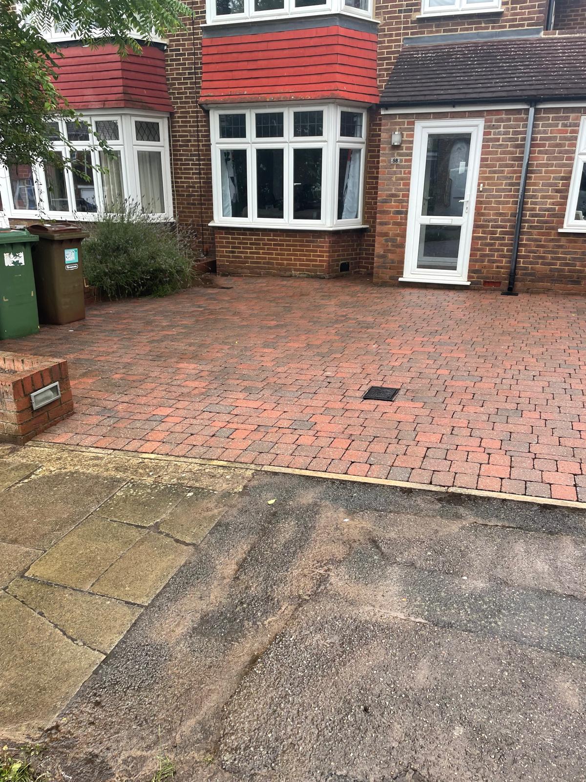Finished clean driveway in Harrow in evening light